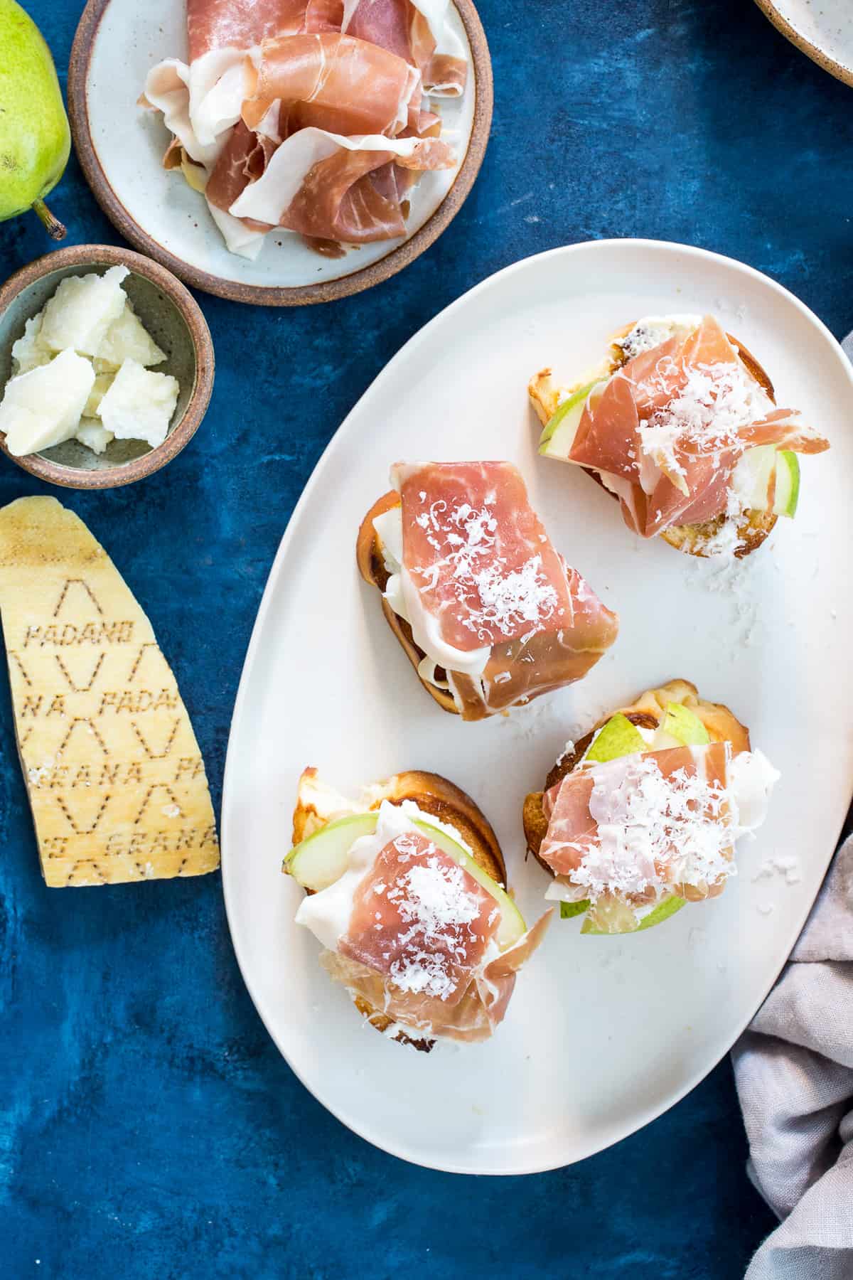 Prosciutto, Pear and Grana Padano Crostini
